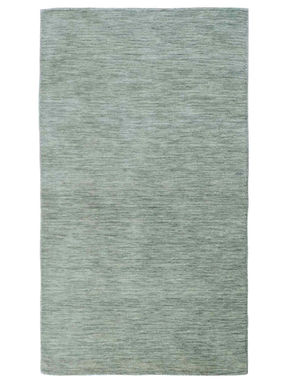 Moderner, Handloom Gabbeh Orientteppich von Khademi aus Wolle, mintgrün. Einfarbiges Uni-Design. Produziert in Indien. Größe: 151x80cm. Teppichnummer: KB4-1564. Verkauf durch Jupiter Intl.