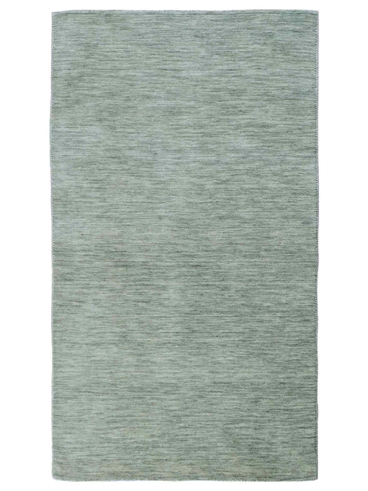 Moderner, Handloom Gabbeh Orientteppich von Khademi aus Wolle, mintgrün. Einfarbiges Uni-Design. Produziert in Indien. Größe: 151x80cm. Teppichnummer: KB4-1564. Verkauf durch Jupiter Intl.