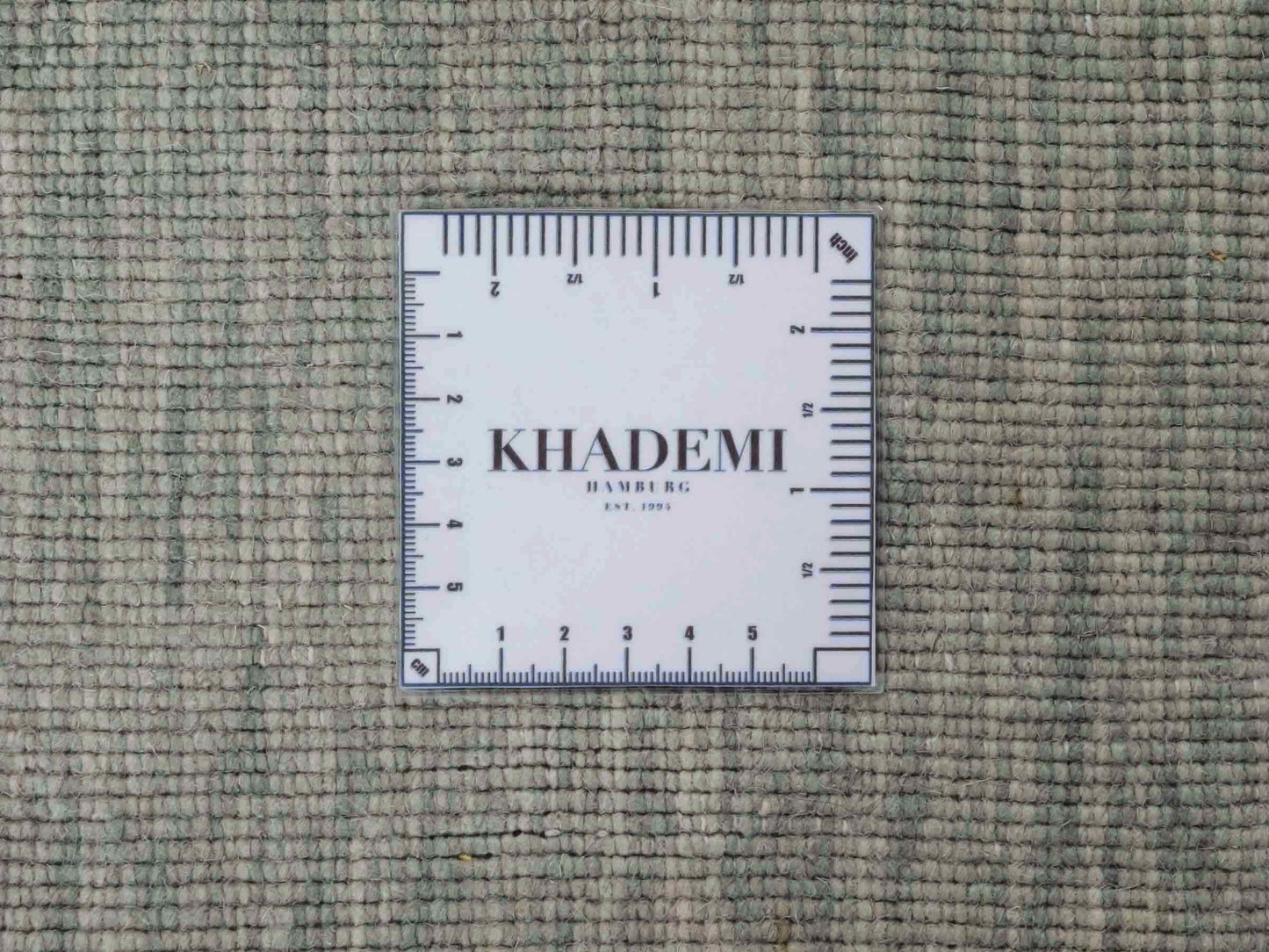 Moderner, Handloom Gabbeh Orientteppich von Khademi aus Wolle, mintgrün. Einfarbiges Uni-Design. Produziert in Indien. Größe: 151x80cm. Teppichnummer: KB4-1564. Verkauf durch Jupiter Intl.