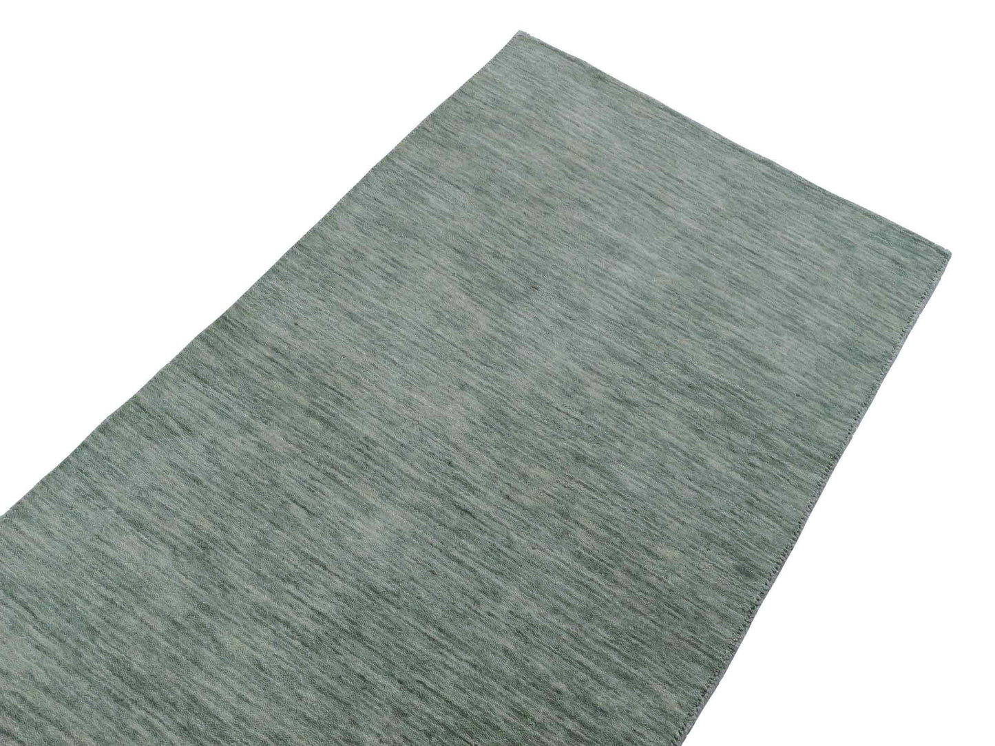 Moderner, Handloom Gabbeh Orientteppich von Khademi aus Wolle, mintgrün. Einfarbiges Uni-Design. Produziert in Indien. Größe: 151x80cm. Teppichnummer: KB4-1564. Verkauf durch Jupiter Intl.