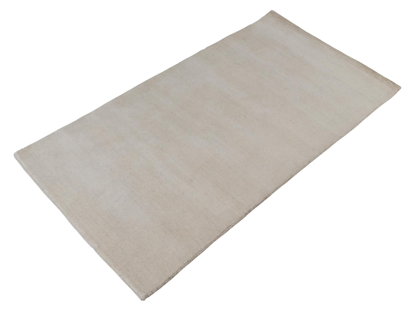 Moderner, Handloom Gabbeh Orientteppich von Khademi aus Wolle, cremeweiß. Einfarbiges Uni-Design. Produziert in Indien. Größe: 155x82cm. Teppichnummer: KB4-1563. Verkauf durch Jupiter Intl.