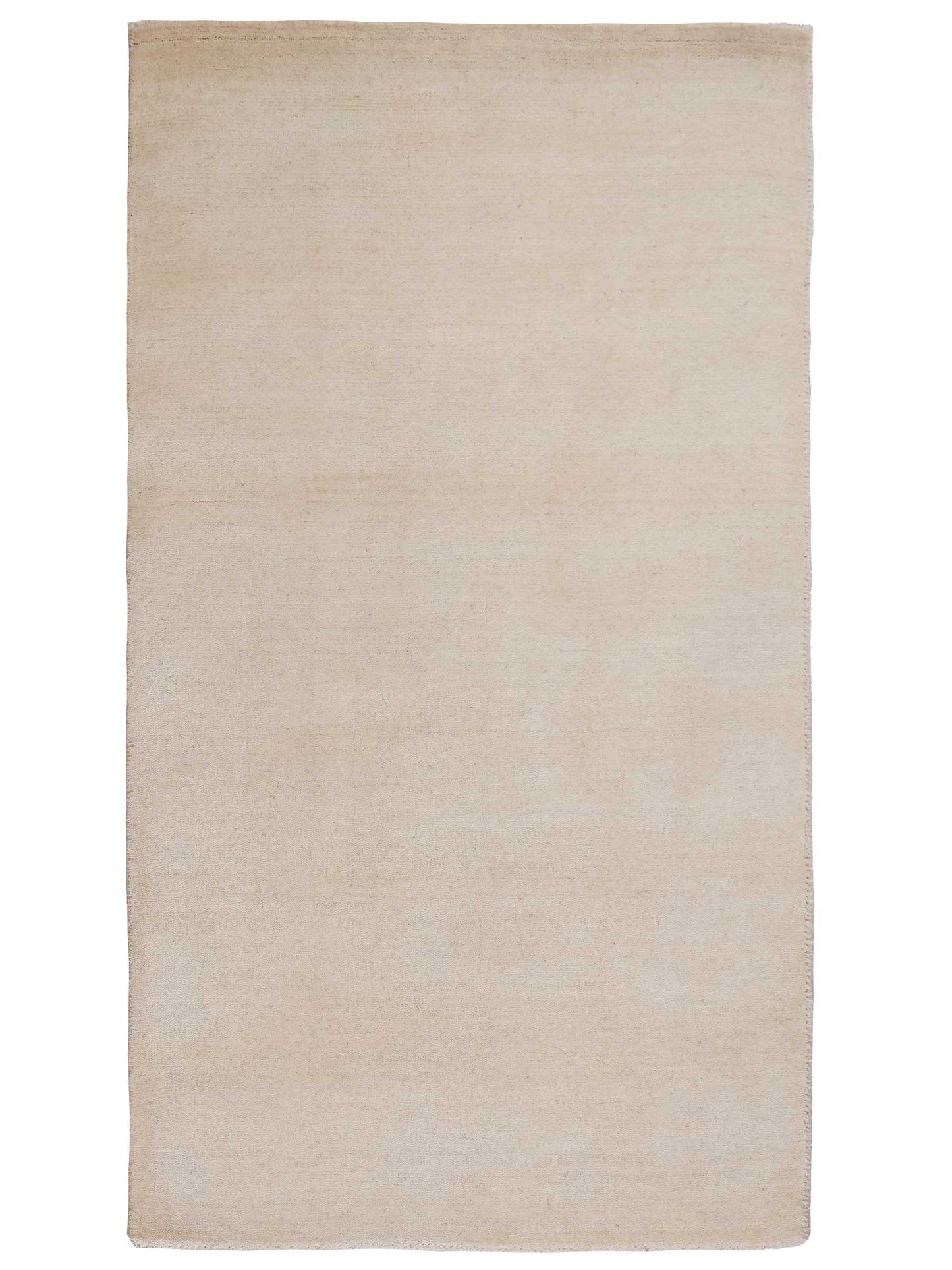 Moderner, Handloom Gabbeh Orientteppich von Khademi aus Wolle, cremeweiß. Einfarbiges Uni-Design. Produziert in Indien. Größe: 156x83cm. Teppichnummer: KB4-1562. Verkauf durch Jupiter Intl.