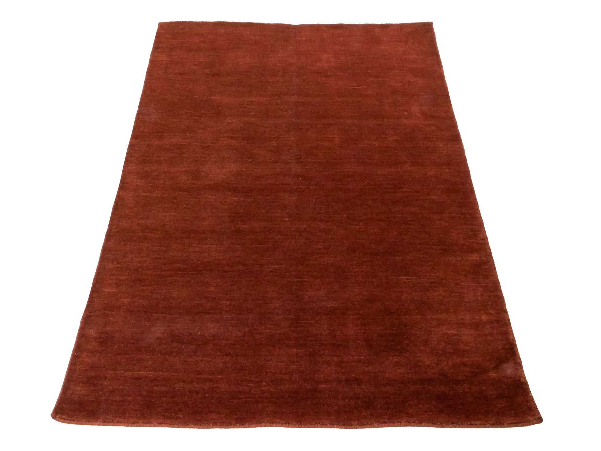 Moderner, Handloom Gabbeh Orientteppich von Khademi aus Wolle, braun. Einfarbiges Uni-Design. Produziert in Indien. Größe: 167x119cm. Teppichnummer: KB4-1575. Verkauf durch Jupiter Intl.