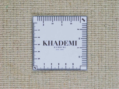 Moderner, Handloom Gabbeh Orientteppich von Khademi aus Wolle, cremeweiß. Einfarbiges Uni-Design. Produziert in Indien. Größe: 170x116cm. Teppichnummer: KB4-1582. Verkauf durch Jupiter Intl.