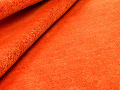 Moderner, Handloom Gabbeh Orientteppich von Khademi aus Wolle, orange. Einfarbiges Uni-Design. Produziert in Indien. Größe: 170x116cm. Teppichnummer: KB4-1574. Verkauf durch Jupiter Intl.