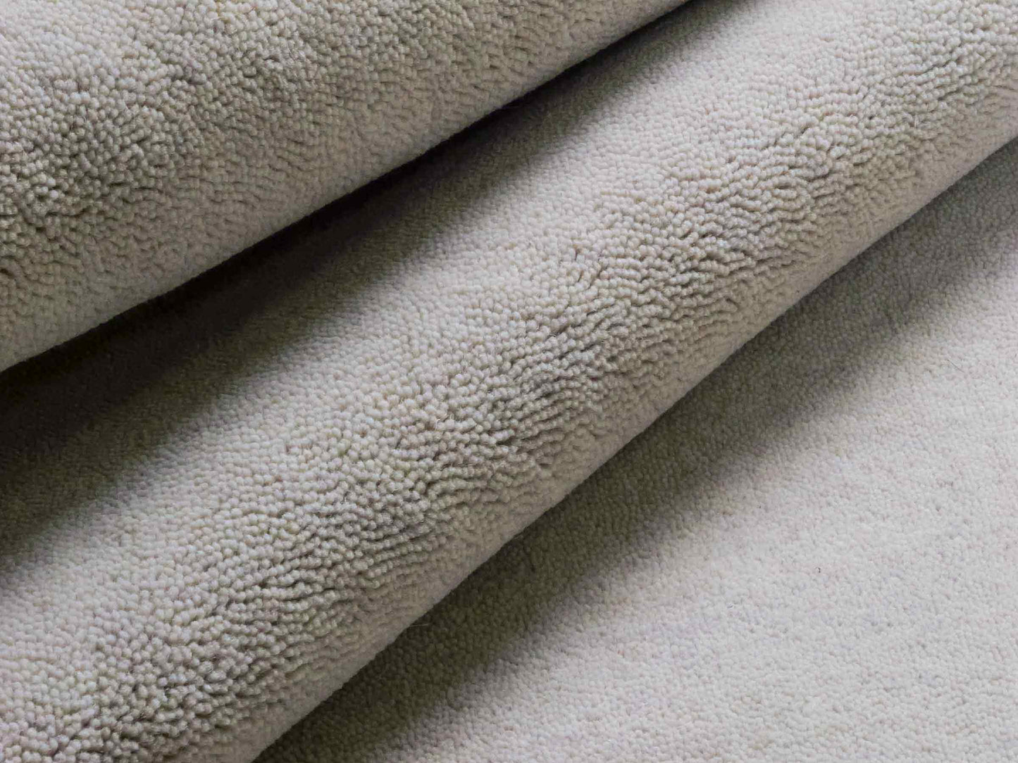 Moderner, Handloom Gabbeh Orientteppich von Khademi aus Wolle, ivory. Einfarbiges Uni-Design. Produziert in Indien. Größe: 170x119cm. Teppichnummer: KB4-1583. Verkauf durch Jupiter Intl.