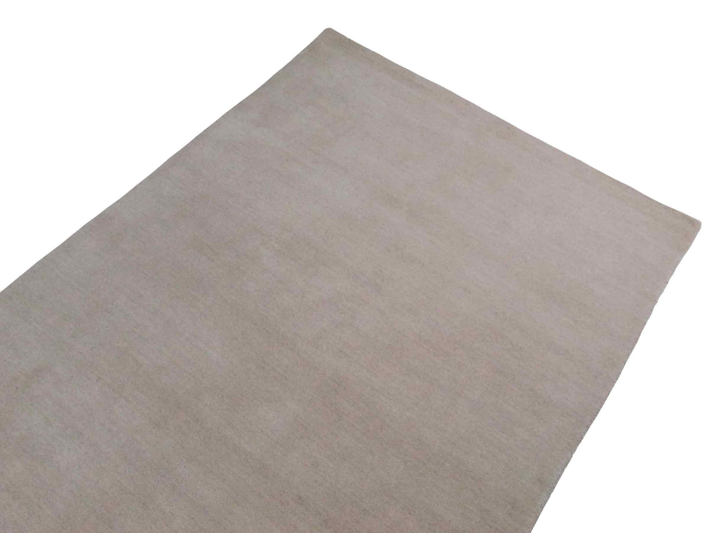 Moderner, Handloom Gabbeh Orientteppich von Khademi aus Wolle, ivory. Einfarbiges Uni-Design. Produziert in Indien. Größe: 170x119cm. Teppichnummer: KB4-1583. Verkauf durch Jupiter Intl.