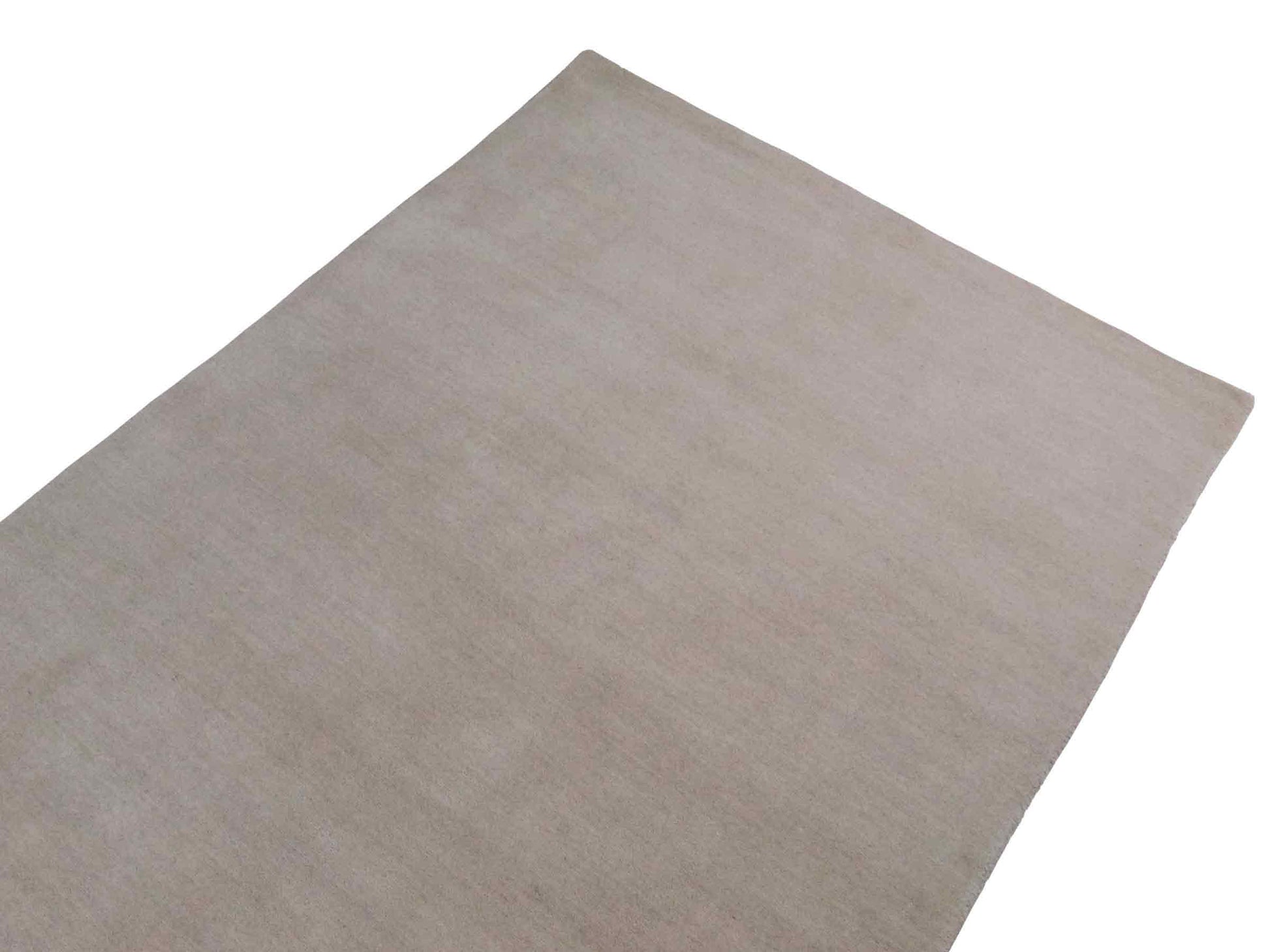 Moderner, Handloom Gabbeh Orientteppich von Khademi aus Wolle, ivory. Einfarbiges Uni-Design. Produziert in Indien. Größe: 170x119cm. Teppichnummer: KB4-1583. Verkauf durch Jupiter Intl.