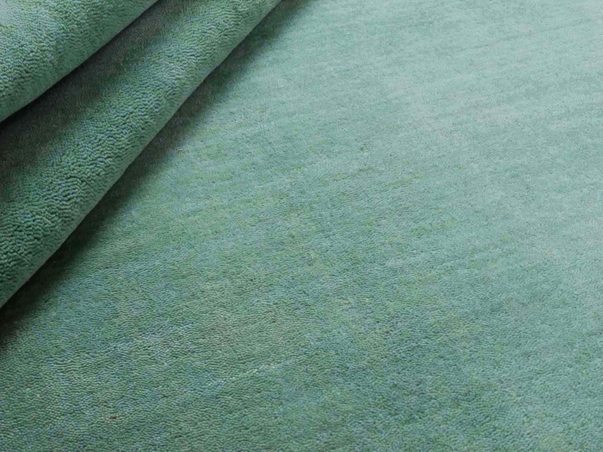 Moderner, Handloom Gabbeh Orientteppich von Khademi aus Wolle, türkis. Einfarbiges Uni-Design. Produziert in Indien. Größe: 170x120cm. Teppichnummer: KB4-1587. Verkauf durch Jupiter Intl.