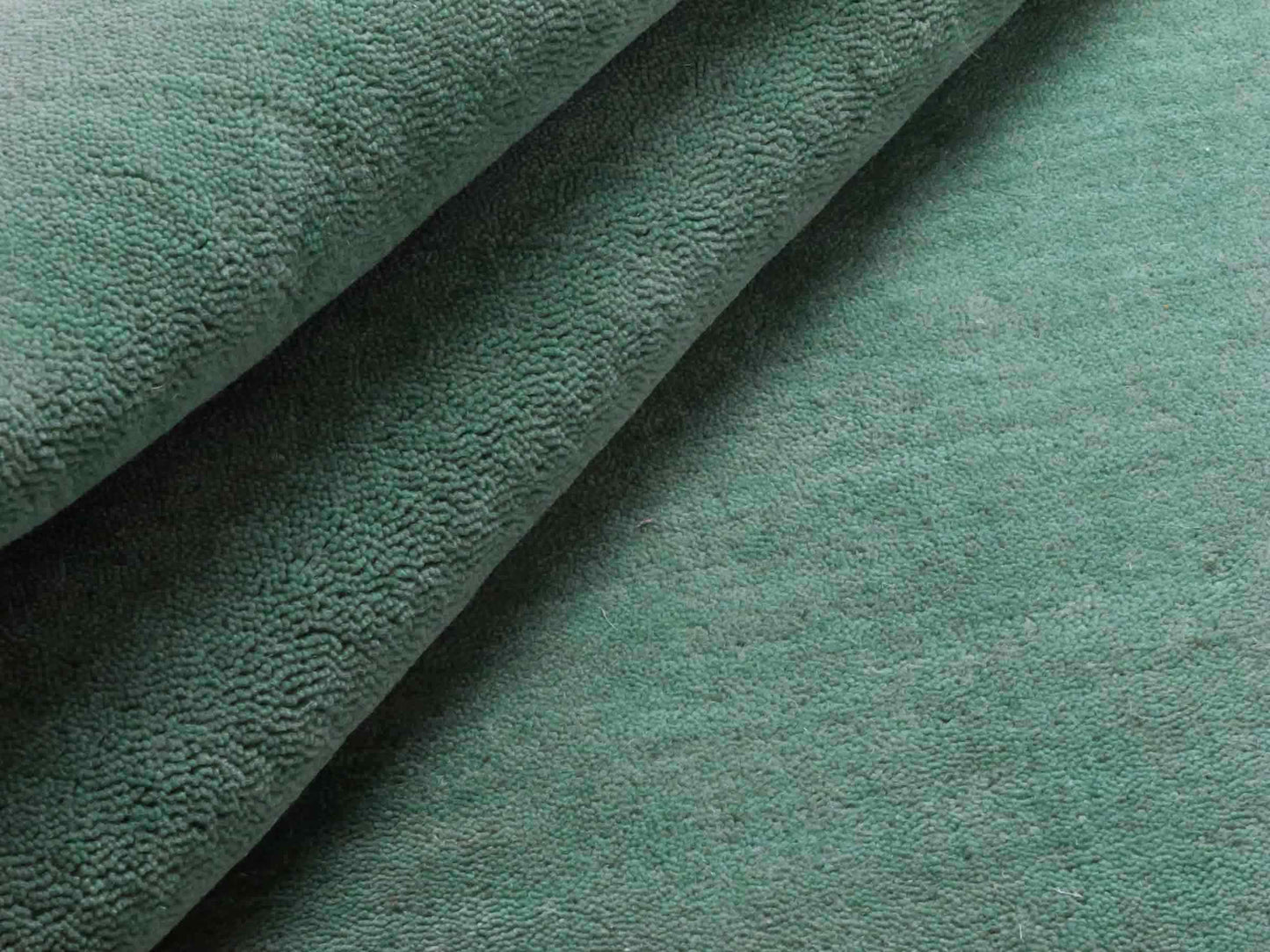 Moderner, Handloom Gabbeh Orientteppich von Khademi aus Wolle, türkis. Einfarbiges Uni-Design. Produziert in Indien. Größe: 170x120cm. Teppichnummer: KB4-1587. Verkauf durch Jupiter Intl.