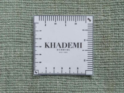 Moderner, Handloom Gabbeh Orientteppich von Khademi aus Wolle, türkis. Einfarbiges Uni-Design. Produziert in Indien. Größe: 170x120cm. Teppichnummer: KB4-1587. Verkauf durch Jupiter Intl.