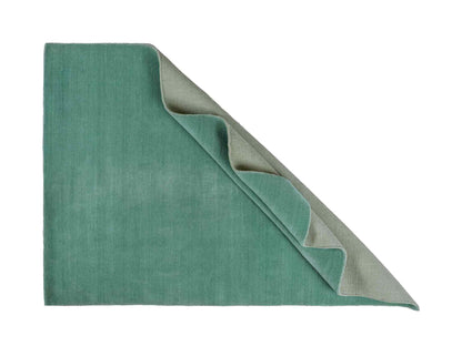 Moderner, Handloom Gabbeh Orientteppich von Khademi aus Wolle, türkis. Einfarbiges Uni-Design. Produziert in Indien. Größe: 170x120cm. Teppichnummer: KB4-1587. Verkauf durch Jupiter Intl.