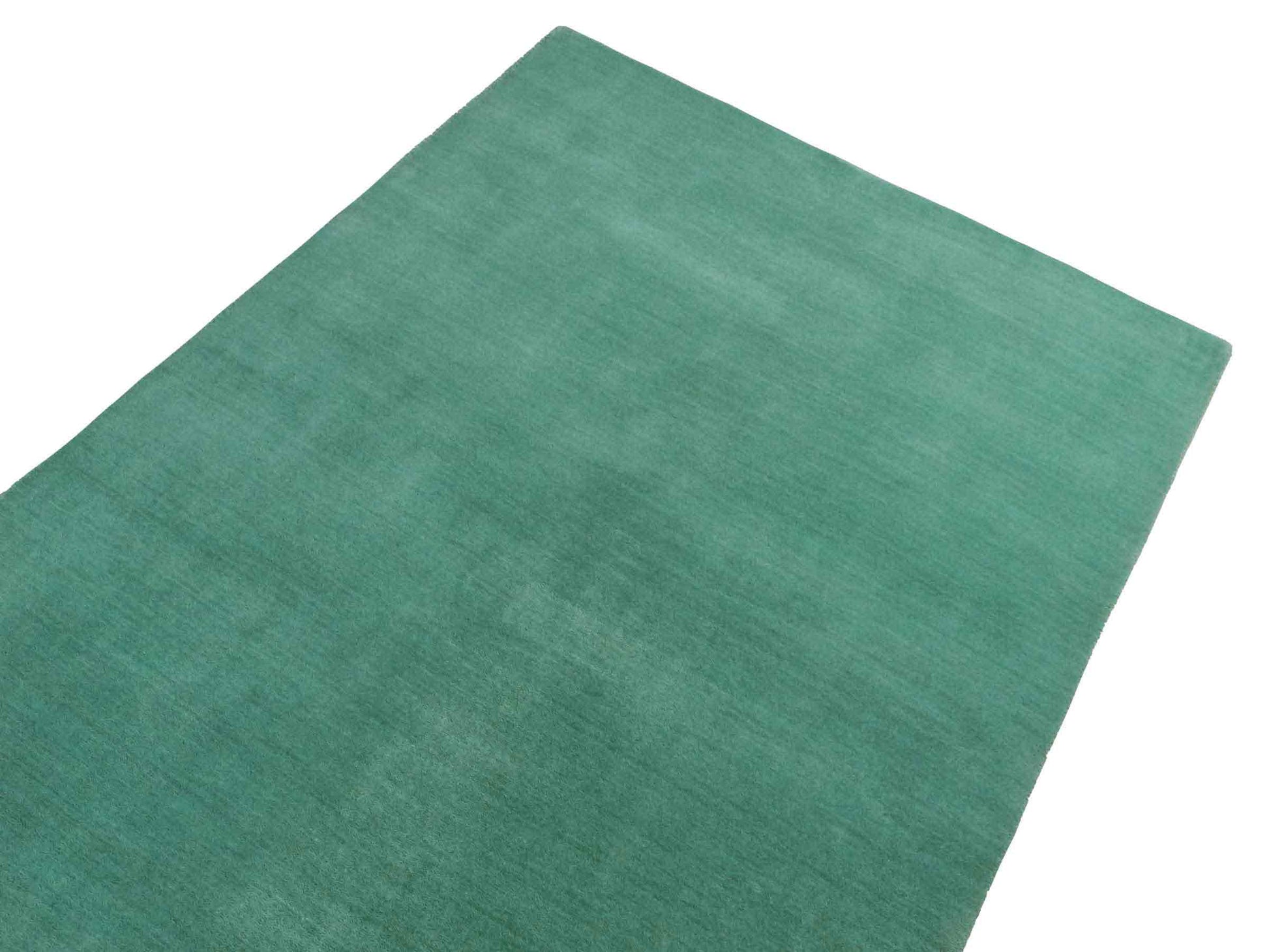 Moderner, Handloom Gabbeh Orientteppich von Khademi aus Wolle, türkis. Einfarbiges Uni-Design. Produziert in Indien. Größe: 170x120cm. Teppichnummer: KB4-1587. Verkauf durch Jupiter Intl.