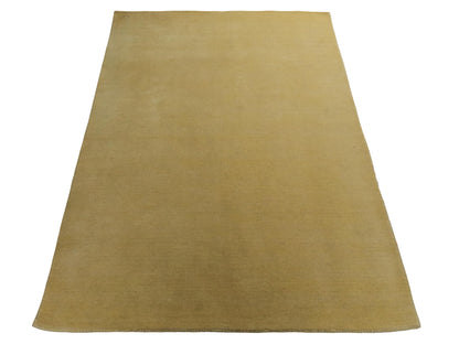 Moderner, Handloom Gabbeh Orientteppich von Khademi aus Wolle, gelb. Einfarbiges Uni-Design. Produziert in Indien. Größe: 171x119cm. Teppichnummer: KB4-1570. Verkauf durch Jupiter Intl.