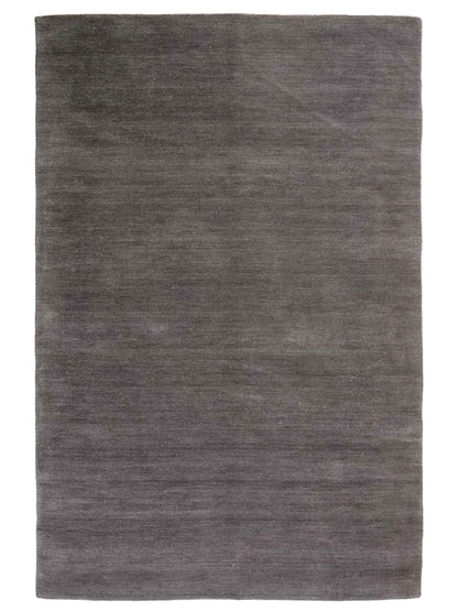 Moderner, Handloom Gabbeh Orientteppich von Khademi aus Wolle, anthrazit. Einfarbiges Uni-Design. Produziert in Indien. Größe: 175x125cm. Teppichnummer: KB4-1585. Verkauf durch Jupiter Intl.