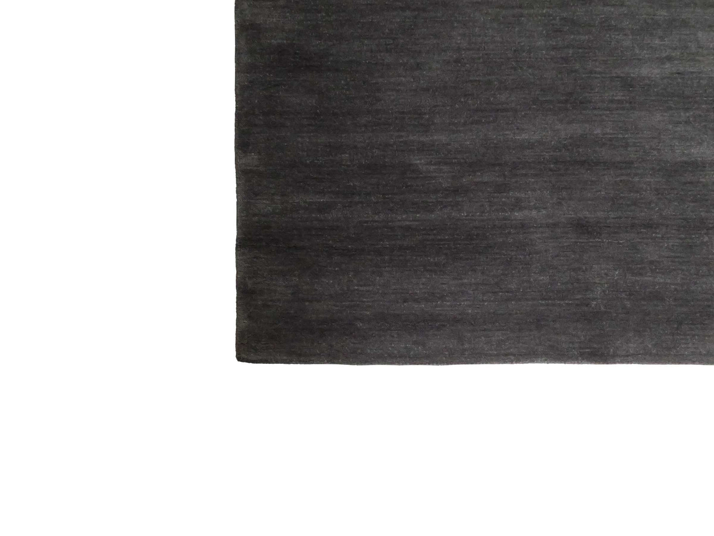 Moderner, Handloom Gabbeh Orientteppich von Khademi aus Wolle, anthrazit. Einfarbiges Uni-Design. Produziert in Indien. Größe: 175x125cm. Teppichnummer: KB4-1585. Verkauf durch Jupiter Intl.