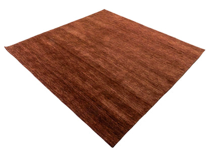 Moderner, Handloom Gabbeh Orientteppich von Khademi aus Wolle, braun. Einfarbiges Uni-Design. Produziert in Indien. Größe: 200x200cm. Teppichnummer: KB4-1596. Verkauf durch Jupiter Intl.