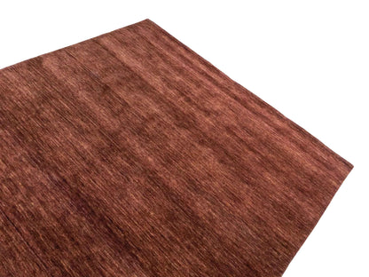 Moderner, Handloom Gabbeh Orientteppich von Khademi aus Wolle, braun. Einfarbiges Uni-Design. Produziert in Indien. Größe: 200x200cm. Teppichnummer: KB4-1596. Verkauf durch Jupiter Intl.