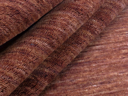 Moderner, Handloom Gabbeh Orientteppich von Khademi aus Wolle, braun. Einfarbiges Uni-Design. Produziert in Indien. Größe: 200x200cm. Teppichnummer: KB4-1597. Verkauf durch Jupiter Intl.