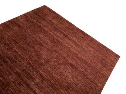 Moderner, Handloom Gabbeh Orientteppich von Khademi aus Wolle, braun. Einfarbiges Uni-Design. Produziert in Indien. Größe: 200x200cm. Teppichnummer: KB4-1597. Verkauf durch Jupiter Intl.