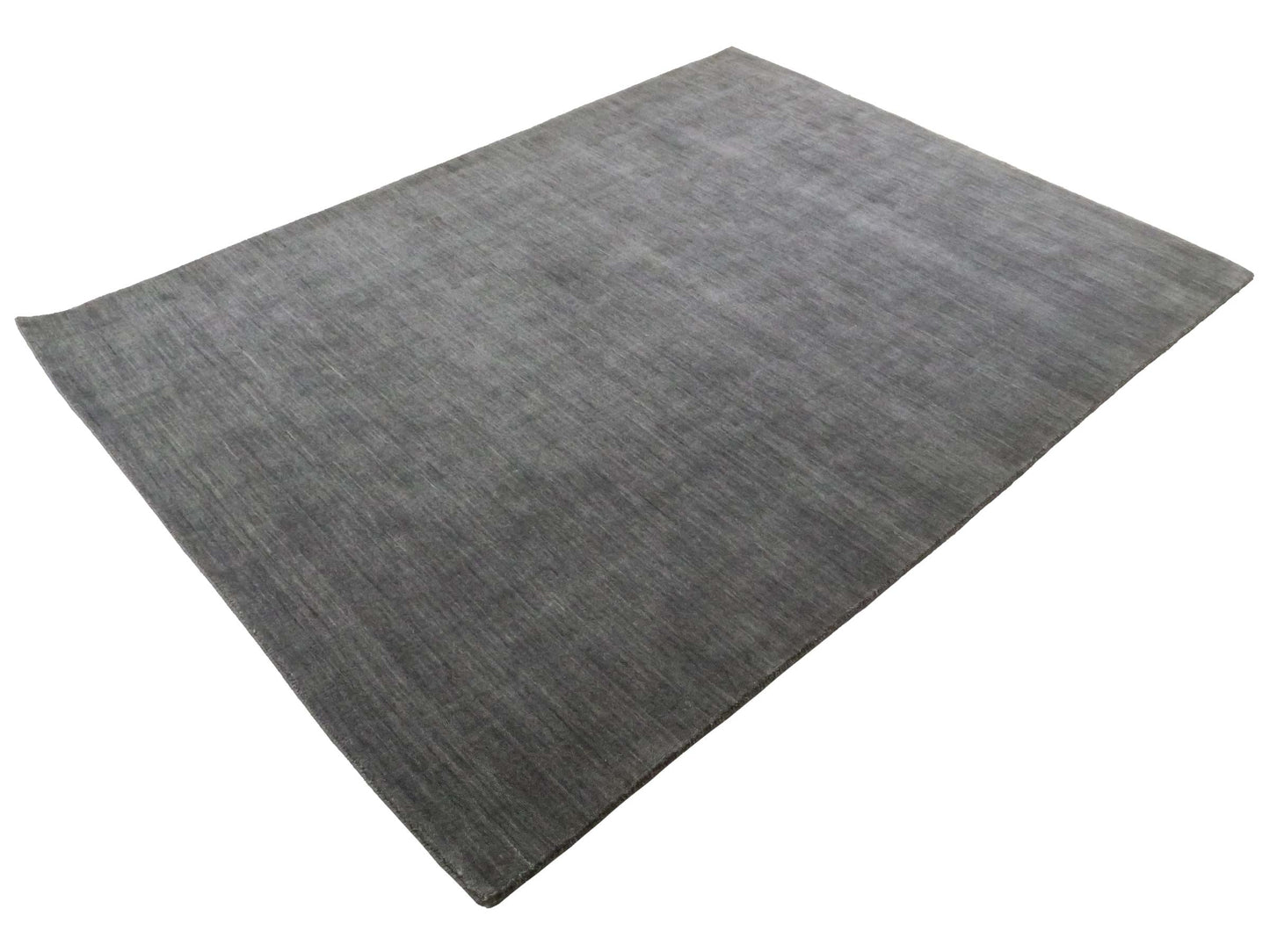 Moderner, Handloom Gabbeh Orientteppich von Khademi aus Wolle, grau. Einfarbiges Uni-Design. Produziert in Indien. Größe: 230x174cm. Teppichnummer: KB4-1611. Verkauf durch Jupiter Intl.