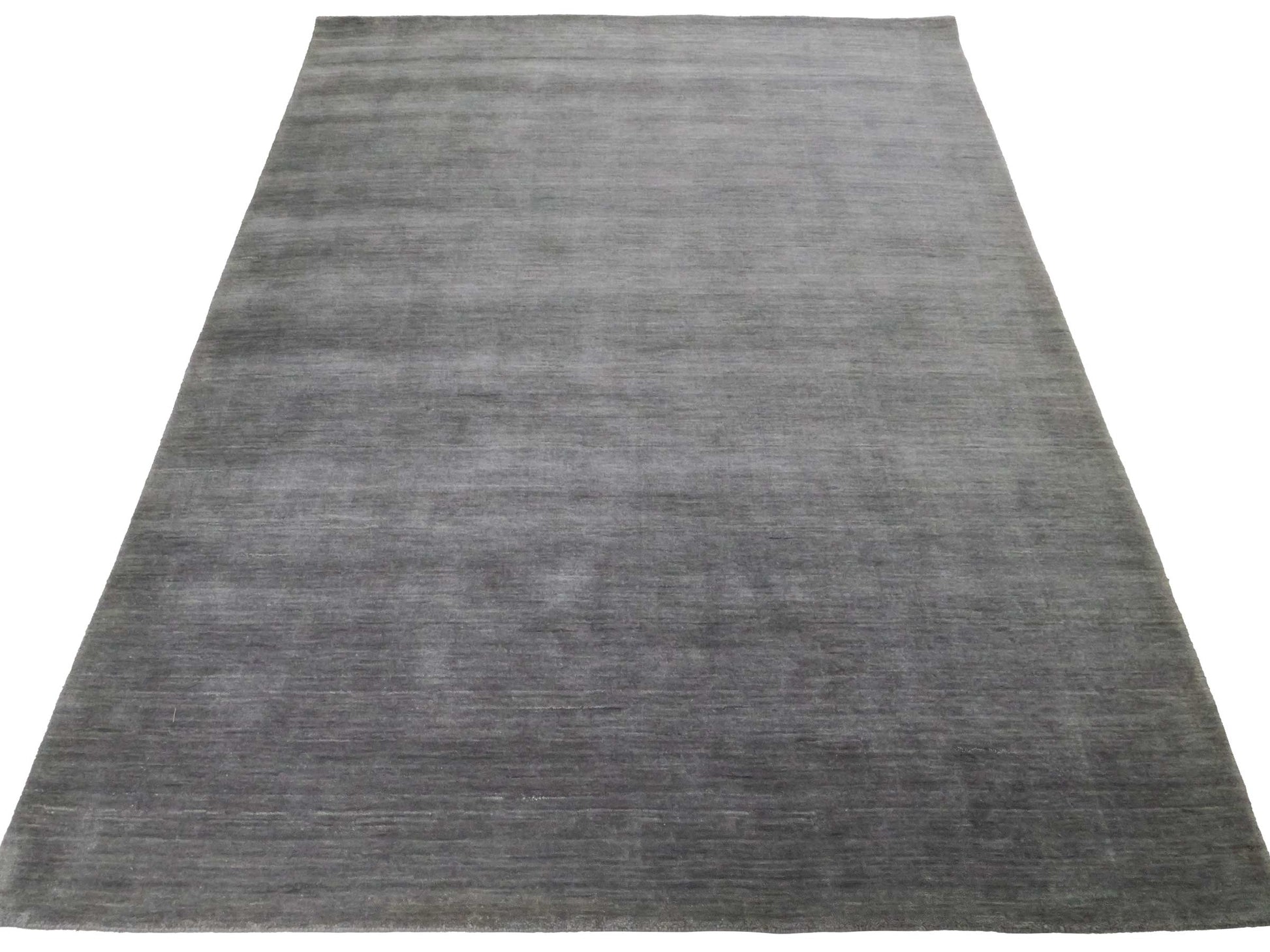 Moderner, Handloom Gabbeh Orientteppich von Khademi aus Wolle, grau. Einfarbiges Uni-Design. Produziert in Indien. Größe: 230x174cm. Teppichnummer: KB4-1611. Verkauf durch Jupiter Intl.