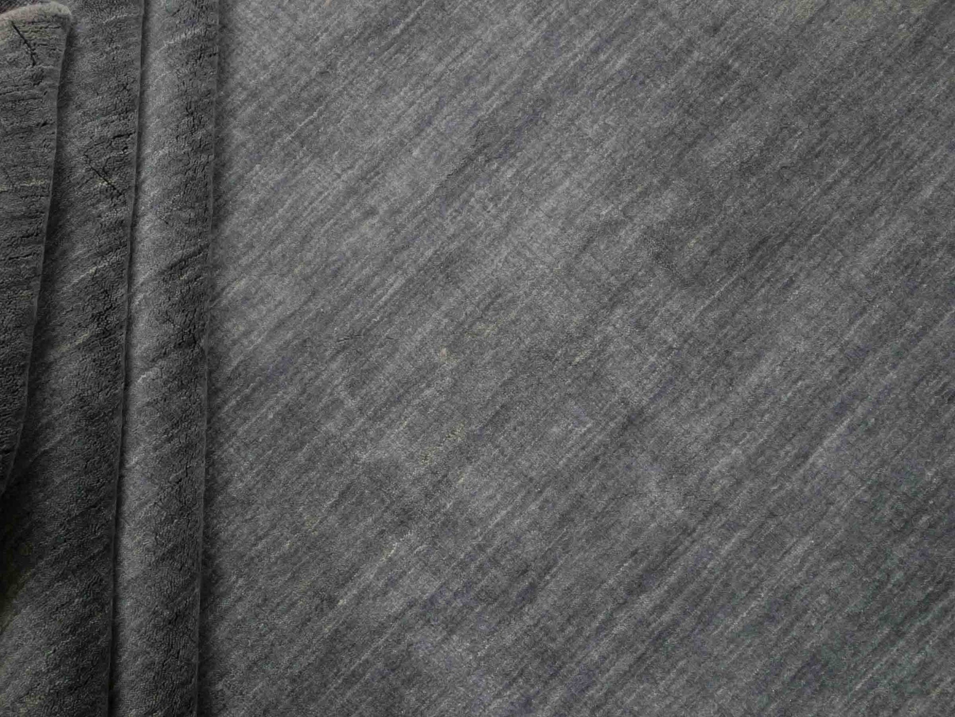 Moderner, Handloom Gabbeh Orientteppich von Khademi aus Wolle, anthrazit. Einfarbiges Uni-Design. Produziert in Indien. Größe: 285x200cm. Teppichnummer: KB4-1614. Verkauf durch Jupiter Intl.