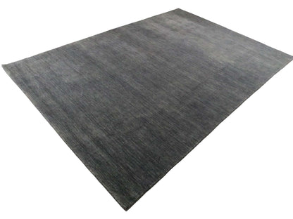 Moderner, Handloom Gabbeh Orientteppich von Khademi aus Wolle, anthrazit. Einfarbiges Uni-Design. Produziert in Indien. Größe: 285x200cm. Teppichnummer: KB4-1614. Verkauf durch Jupiter Intl.