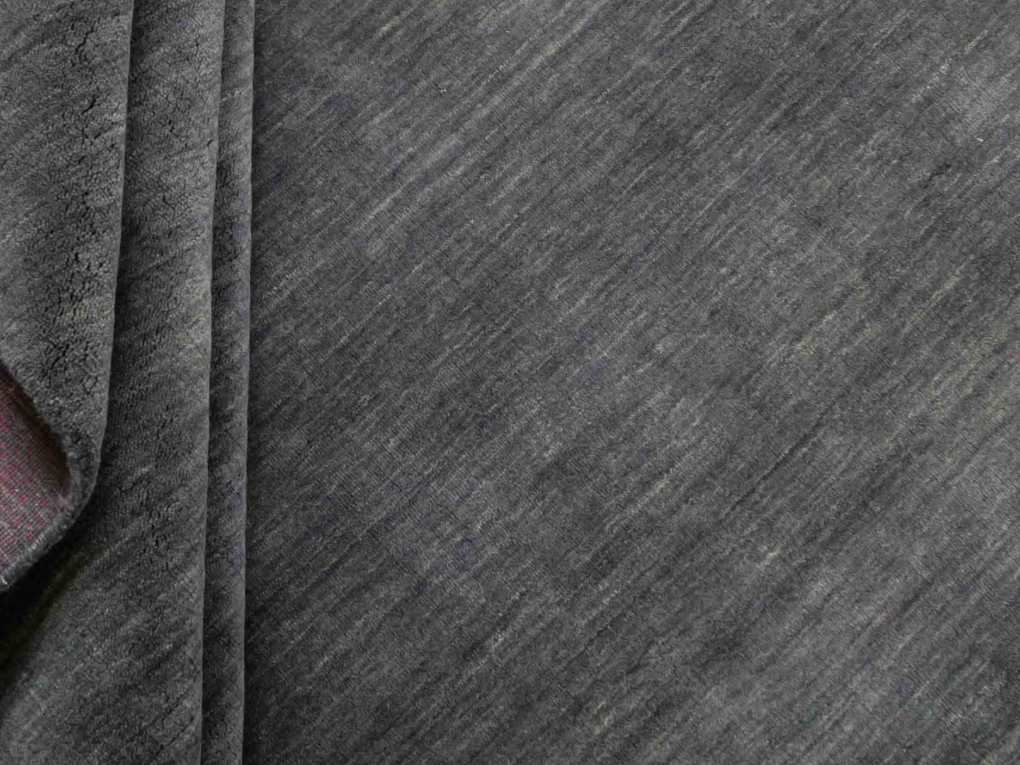 Moderner, Handloom Gabbeh Orientteppich von Khademi aus Wolle, anthrazit. Einfarbiges Uni-Design. Produziert in Indien. Größe: 292x200cm. Teppichnummer: KB4-1613. Verkauf durch Jupiter Intl.