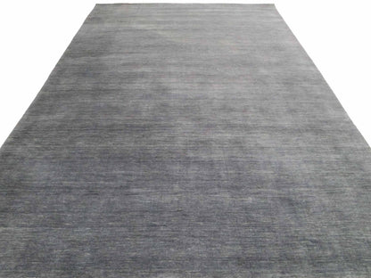 Moderner, Handloom Gabbeh Orientteppich von Khademi aus Wolle, anthrazit. Einfarbiges Uni-Design. Produziert in Indien. Größe: 292x200cm. Teppichnummer: KB4-1613. Verkauf durch Jupiter Intl.