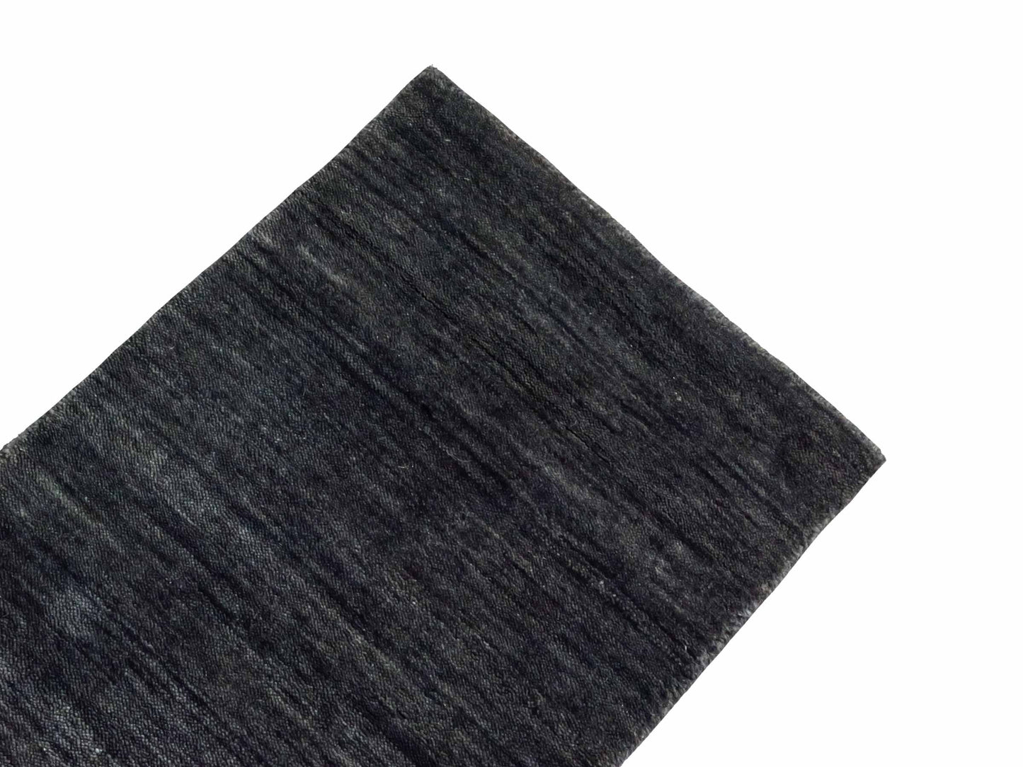 Moderner, Handloom Gabbeh Orientteppich von Khademi aus Wolle, anthrazit-grau. Einfarbiges Uni-Design. Produziert in Indien. Größe: 60x40cm. Teppichnummer: KB4-1617. Verkauf durch Jupiter Intl.