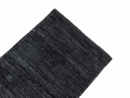 Moderner, Handloom Gabbeh Orientteppich von Khademi aus Wolle, anthrazit-grau. Einfarbiges Uni-Design. Produziert in Indien. Größe: 60x40cm. Teppichnummer: KB4-1617. Verkauf durch Jupiter Intl.