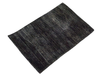 Moderner, Handloom Gabbeh Orientteppich von Khademi aus Wolle, anthrazit-grau. Einfarbiges Uni-Design. Produziert in Indien. Größe: 60x40cm. Teppichnummer: KB4-1617D. Verkauf durch Jupiter Intl.