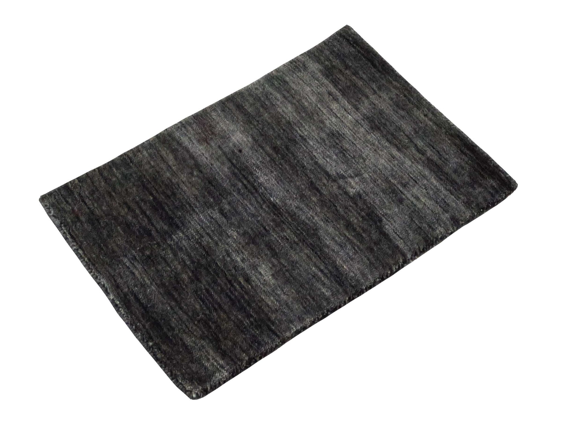 Moderner, Handloom Gabbeh Orientteppich von Khademi aus Wolle, anthrazit-grau. Einfarbiges Uni-Design. Produziert in Indien. Größe: 60x40cm. Teppichnummer: KB4-1617D. Verkauf durch Jupiter Intl.