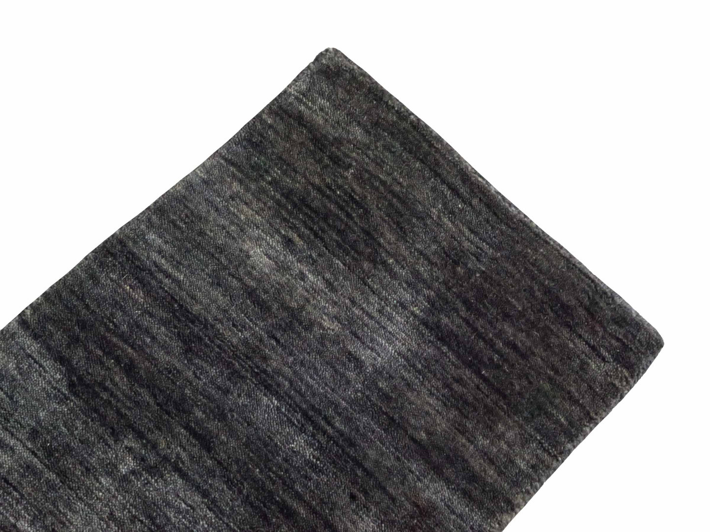 Moderner, Handloom Gabbeh Orientteppich von Khademi aus Wolle, anthrazit-grau. Einfarbiges Uni-Design. Produziert in Indien. Größe: 60x40cm. Teppichnummer: KB4-1617D. Verkauf durch Jupiter Intl.