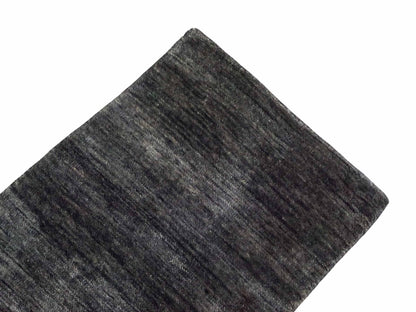 Moderner, Handloom Gabbeh Orientteppich von Khademi aus Wolle, anthrazit-grau. Einfarbiges Uni-Design. Produziert in Indien. Größe: 60x40cm. Teppichnummer: KB4-1617D. Verkauf durch Jupiter Intl.