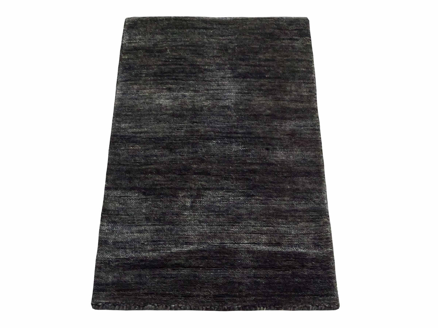 Moderner, Handloom Gabbeh Orientteppich von Khademi aus Wolle, anthrazit-grau. Einfarbiges Uni-Design. Produziert in Indien. Größe: 60x40cm. Teppichnummer: KB4-1617D. Verkauf durch Jupiter Intl.