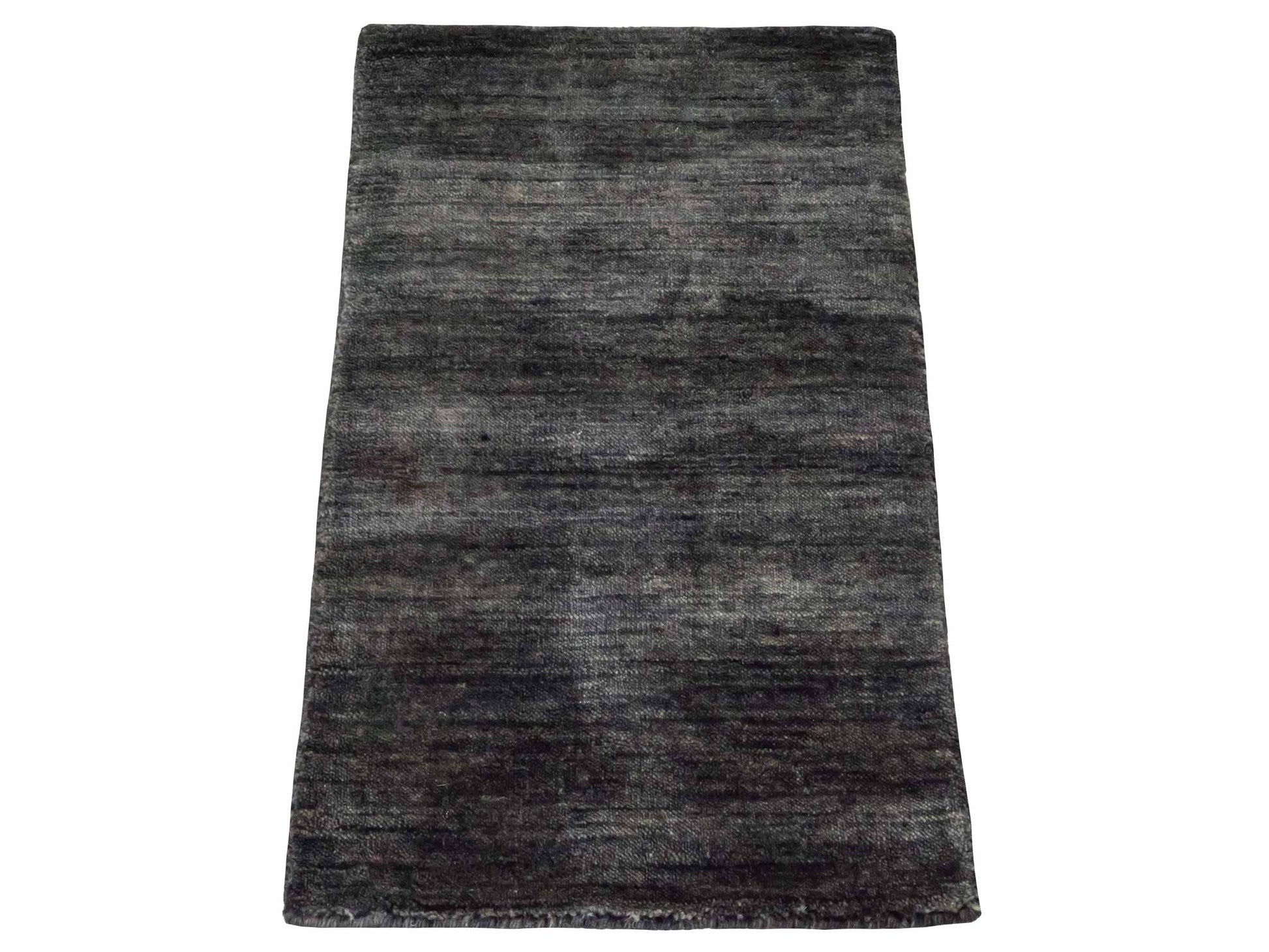 Moderner, Handloom Gabbeh Orientteppich von Khademi aus Wolle, anthrazit-grau. Einfarbiges Uni-Design. Produziert in Indien. Größe: 60x40cm. Teppichnummer: KB4-1617D. Verkauf durch Jupiter Intl.