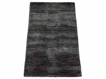 Moderner, Handloom Gabbeh Orientteppich von Khademi aus Wolle, anthrazit-grau. Einfarbiges Uni-Design. Produziert in Indien. Größe: 60x40cm. Teppichnummer: KB4-1617D. Verkauf durch Jupiter Intl.