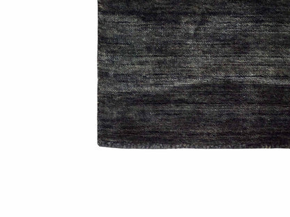 Moderner, Handloom Gabbeh Orientteppich von Khademi aus Wolle, anthrazit-grau. Einfarbiges Uni-Design. Produziert in Indien. Größe: 60x40cm. Teppichnummer: KB4-1617D. Verkauf durch Jupiter Intl.