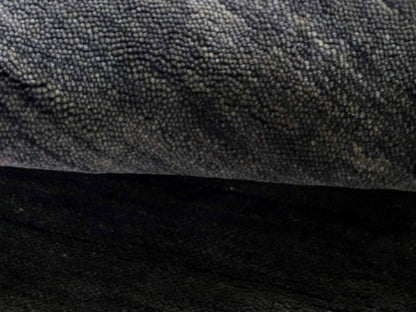 Moderner, Handloom Gabbeh Orientteppich von Khademi aus Wolle, anthrazit-grau. Einfarbiges Uni-Design. Produziert in Indien. Größe: 60x40cm. Teppichnummer: KB4-1617D. Verkauf durch Jupiter Intl.