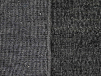 Moderner, Handloom Gabbeh Orientteppich von Khademi aus Wolle, grau. Einfarbiges Uni-Design. Produziert in Indien. Größe: 86x60cm. Teppichnummer: KB4-1609. Verkauf durch Jupiter Intl.