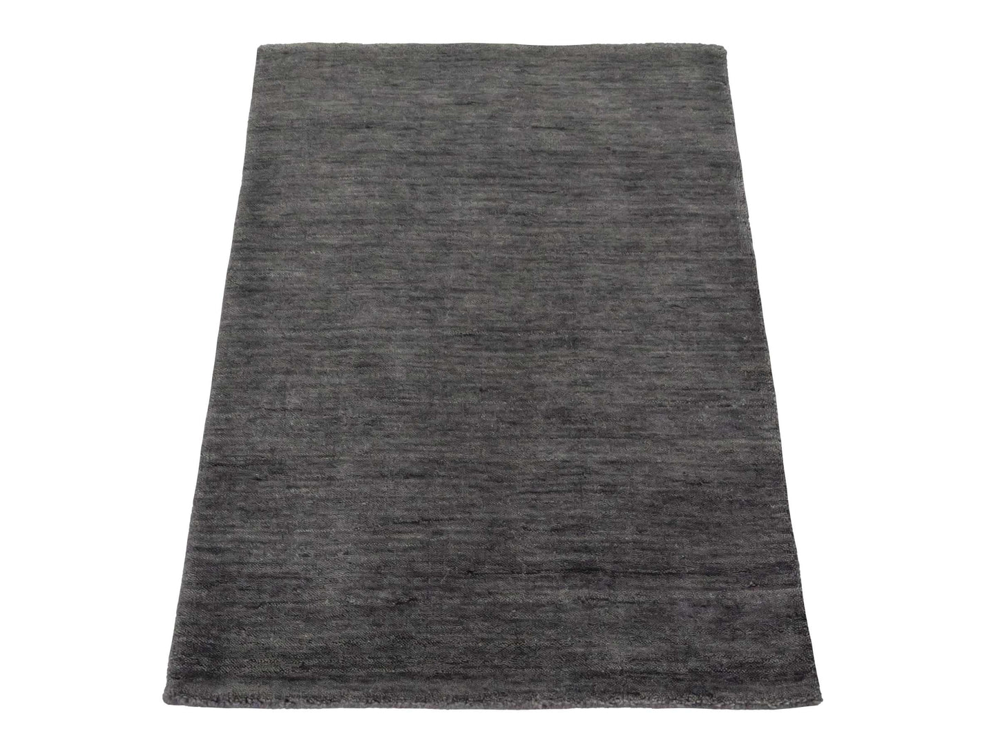 Moderner, Handloom Gabbeh Orientteppich von Khademi aus Wolle, grau. Einfarbiges Uni-Design. Produziert in Indien. Größe: 86x60cm. Teppichnummer: KB4-1609. Verkauf durch Jupiter Intl.