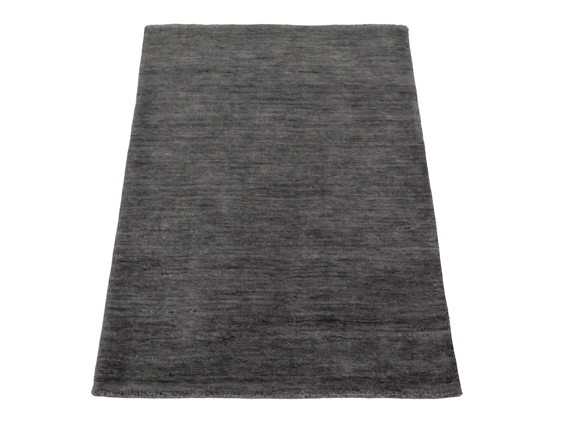 Moderner, Handloom Gabbeh Orientteppich von Khademi aus Wolle, grau. Einfarbiges Uni-Design. Produziert in Indien. Größe: 86x60cm. Teppichnummer: KB4-1609. Verkauf durch Jupiter Intl.