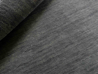 Moderner, Handloom Gabbeh Orientteppich von Khademi aus Wolle, grau. Einfarbiges Uni-Design. Produziert in Indien. Größe: 88x60cm. Teppichnummer: KB4-1610. Verkauf durch Jupiter Intl.