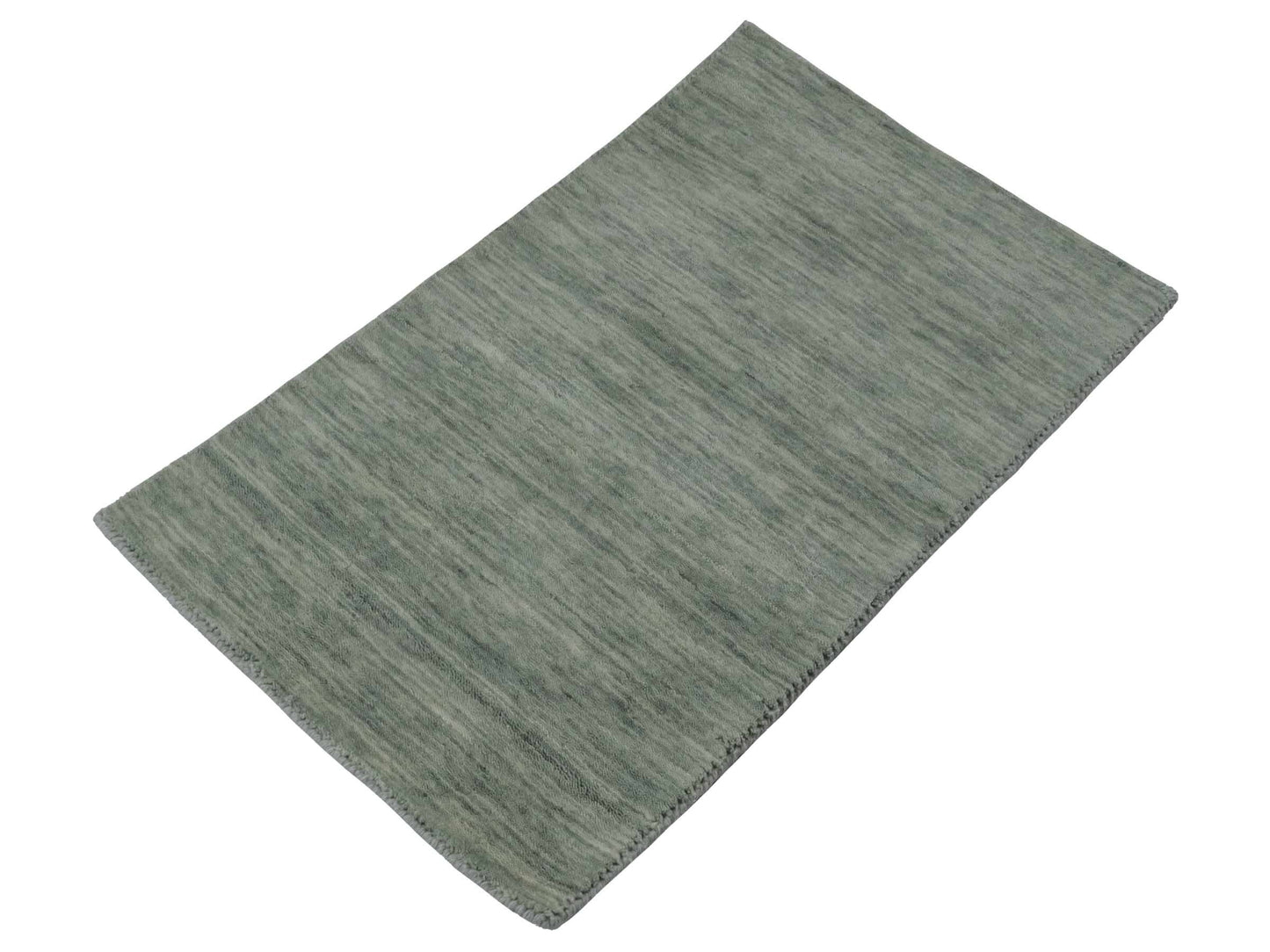 Moderner, Handloom Gabbeh Orientteppich von Khademi aus Wolle, mintgrün. Einfarbiges Uni-Design. Produziert in Indien. Größe: 93x60cm. Teppichnummer: KB4-1567. Verkauf durch Jupiter Intl.