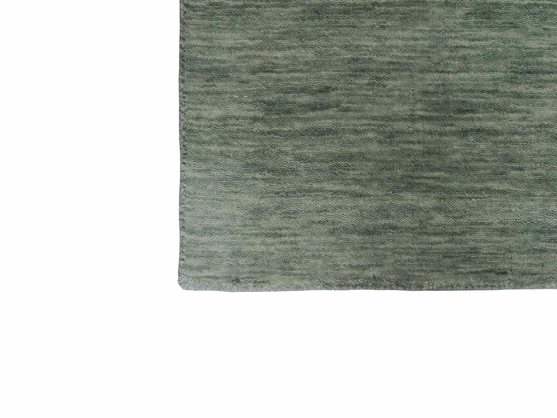 Moderner, Handloom Gabbeh Orientteppich von Khademi aus Wolle, mintgrün. Einfarbiges Uni-Design. Produziert in Indien. Größe: 93x60cm. Teppichnummer: KB4-1567. Verkauf durch Jupiter Intl.