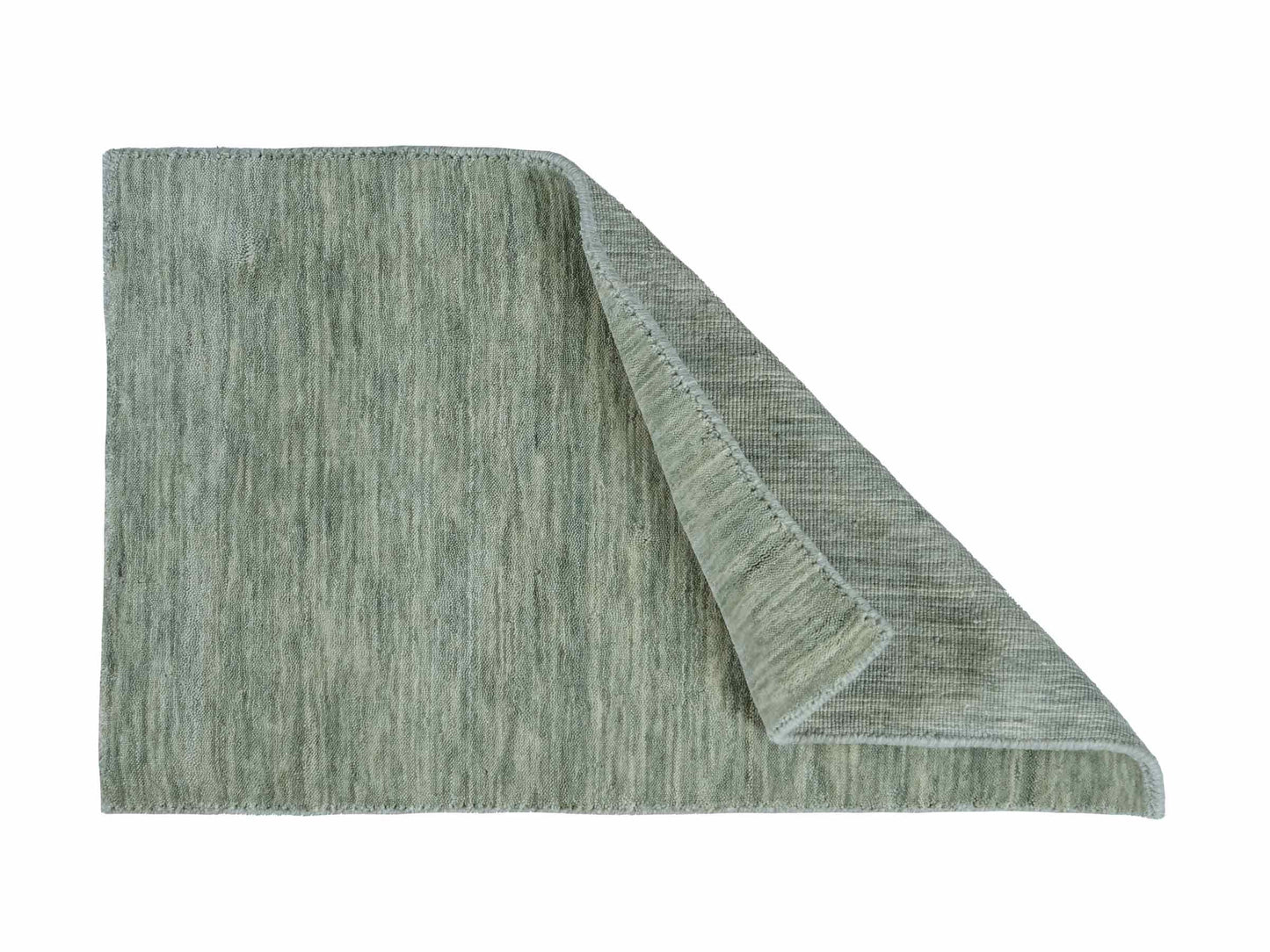 Moderner, Handloom Gabbeh Orientteppich von Khademi aus Wolle, mintgrün. Einfarbiges Uni-Design. Produziert in Indien. Größe: 93x60cm. Teppichnummer: KB4-1568. Verkauf durch Jupiter Intl.