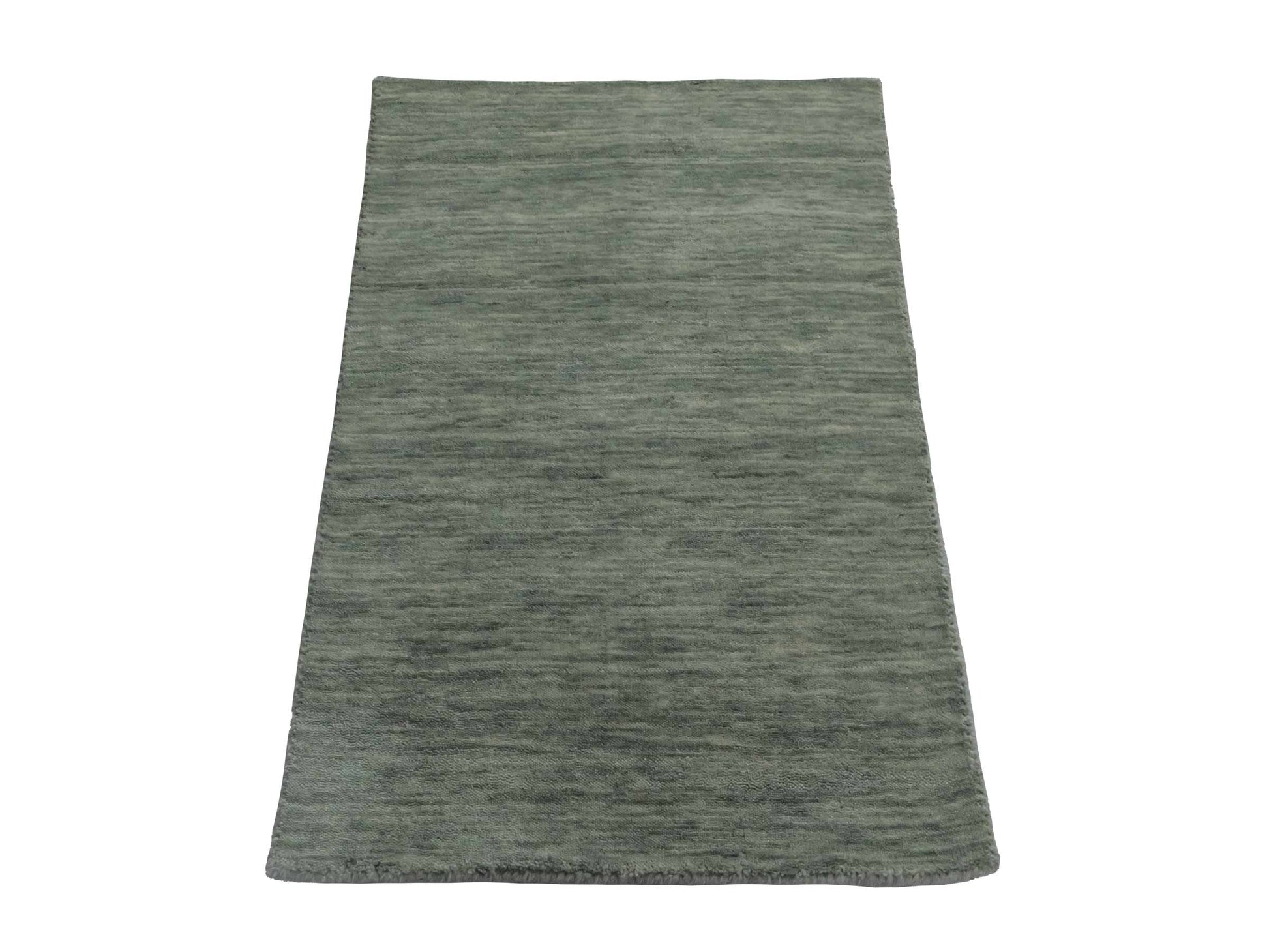 Moderner, Handloom Gabbeh Orientteppich von Khademi aus Wolle, mintgrün. Einfarbiges Uni-Design. Produziert in Indien. Größe: 93x60cm. Teppichnummer: KB4-1568. Verkauf durch Jupiter Intl.