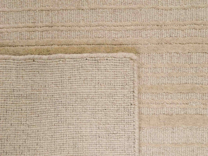 Moderner, Handloom Lori Orientteppich von Khademi aus Wolle, beige. Geometrisches Design. Produziert in Indien. Größe: 150x80cm. Teppichnummer: KB4-1525. Verkauf durch Jupiter Intl.